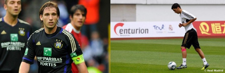 Real Madrid's Nuri Sahin (R) and Anderlecht's Lucas Biglia