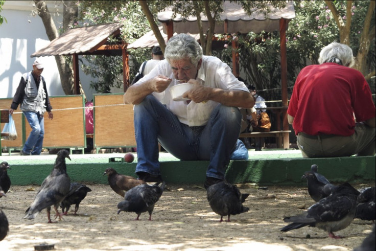 A man eats his meal at a soup kitchen for the poor in central Athens (Photo: Reuters)