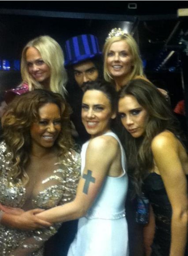 Russell Brand admitted he had a crush on Geri Halliwell after posing for this photo with the Spice Girls backstage at the Olympics.