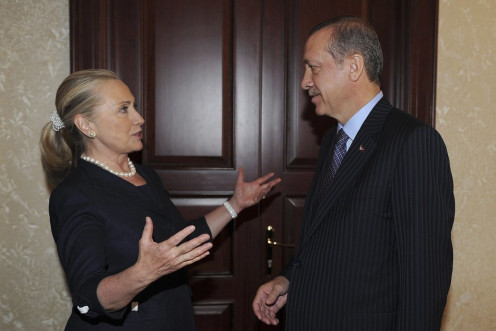 Turkey's Prime Minister Erdogan talks with U.S. Secretary of State Clinton before their meeting