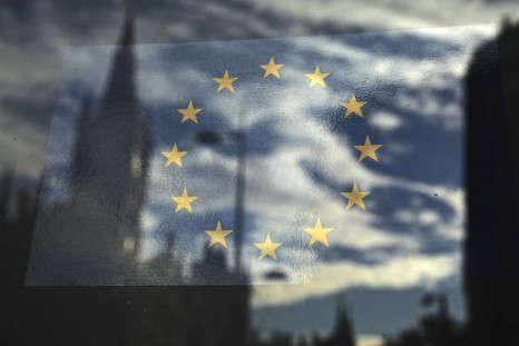The European Union flag is pictured in a window reflecting a street in London (Photo: Reuters)