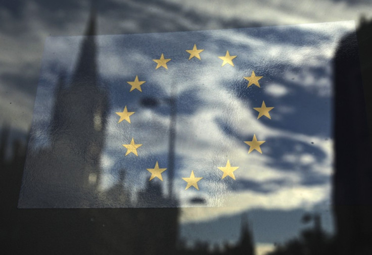 The European Union flag is pictured in a window reflecting a street in London (Photo: Reuters)