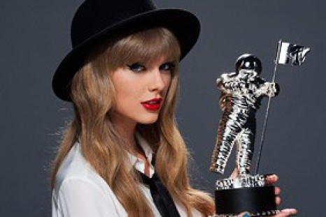 Taylor Swift poses with MTV Video Music Awards trophy in 2009. Swift will join a flotilla of performers at VMA 2012.