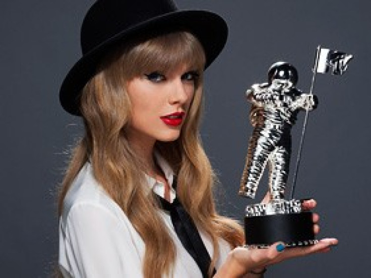 Taylor Swift poses with MTV Video Music Awards trophy in 2009. Swift will join a flotilla of performers at VMA 2012.
