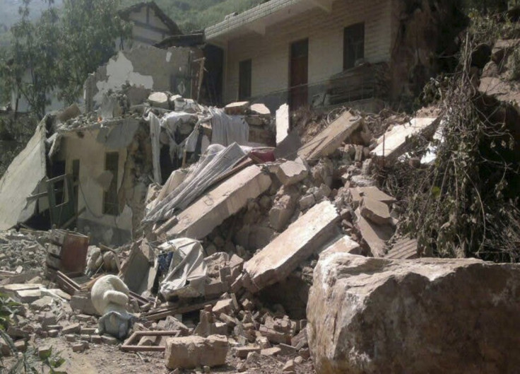 A collapsed house is seen after two earthquakes in Zhaotong, Yunnan province (Reuters)