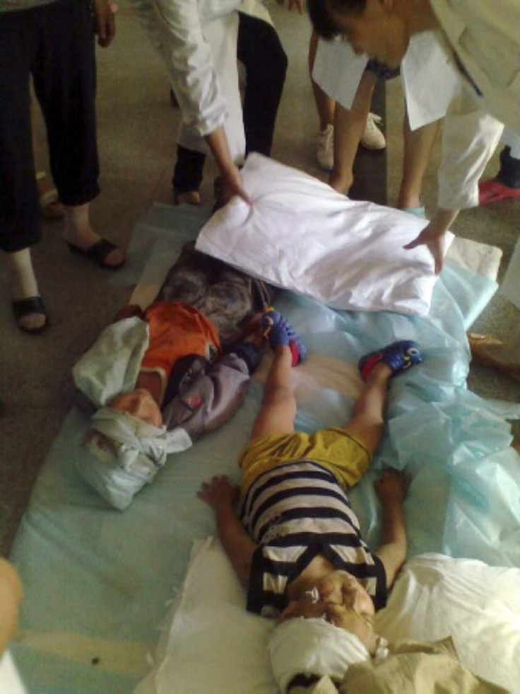 Injured children lie on the floor at a hospital after two earthquakes hit Zhaotong (Reuters)