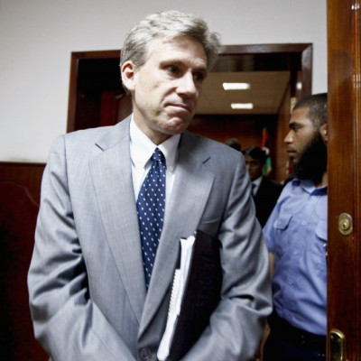 Christopher Stevens, the U.S. ambassador to Libya, leaves after a meeting in Tripoli