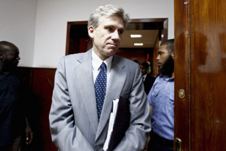 Christopher Stevens, the U.S. ambassador to Libya, leaves after a meeting in Tripoli