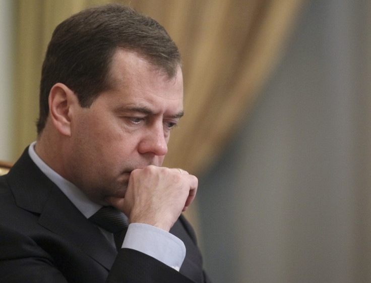 Russia's PM Medvedev looks on during a government session at the Russian White House in Moscow