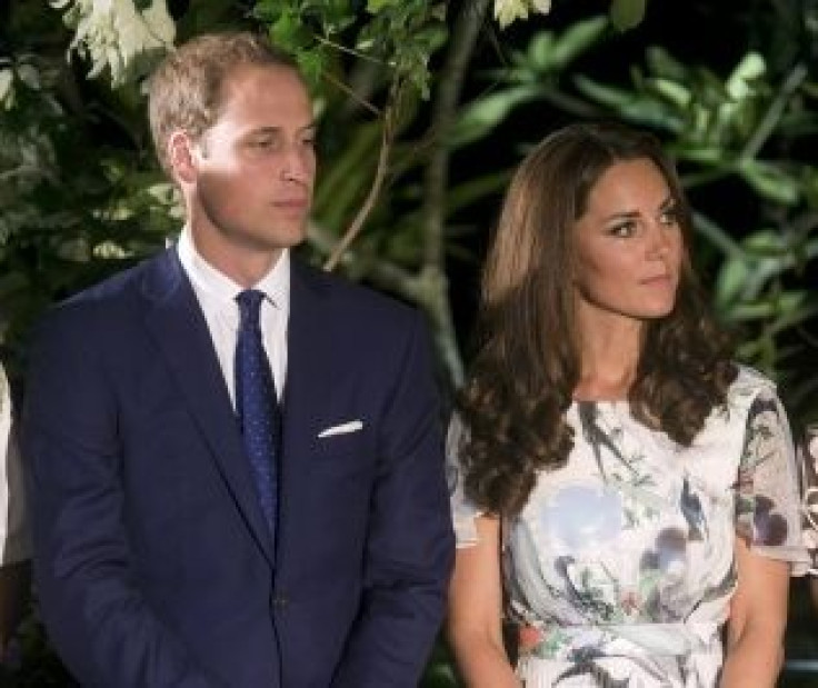 Prince William and his wife Catherine, the Duchess of Cambridge, listen to a speech at a British Gala reception at the Eden Hall in Singapore September 12, 2012. The royal couple will file a criminal law suit against French magazine Closer for breaching t