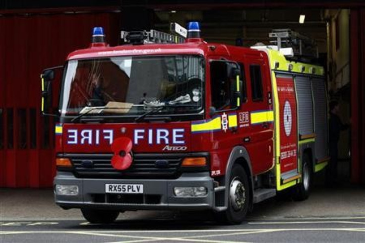 South Wales Fire and Rescue Service said the house was “well alight” when crews arrived (Reuters)