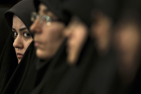 A religious activist looks on while attending the 25th International Islamic Unity Conference in Tehran