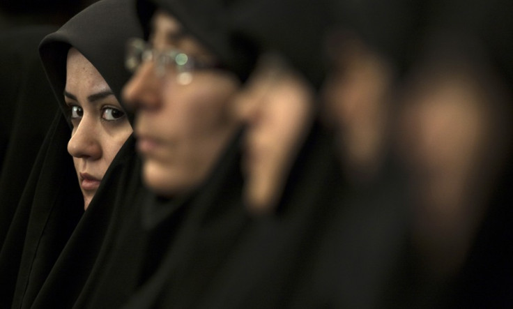 A religious activist looks on while attending the 25th International Islamic Unity Conference in Tehran