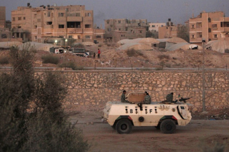 An armoured vehicle patrols the border with Gaza Strip