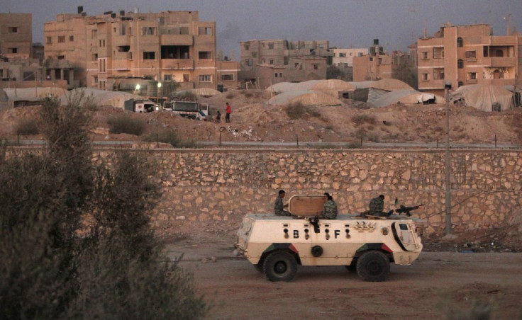 An armoured vehicle patrols the border with Gaza Strip