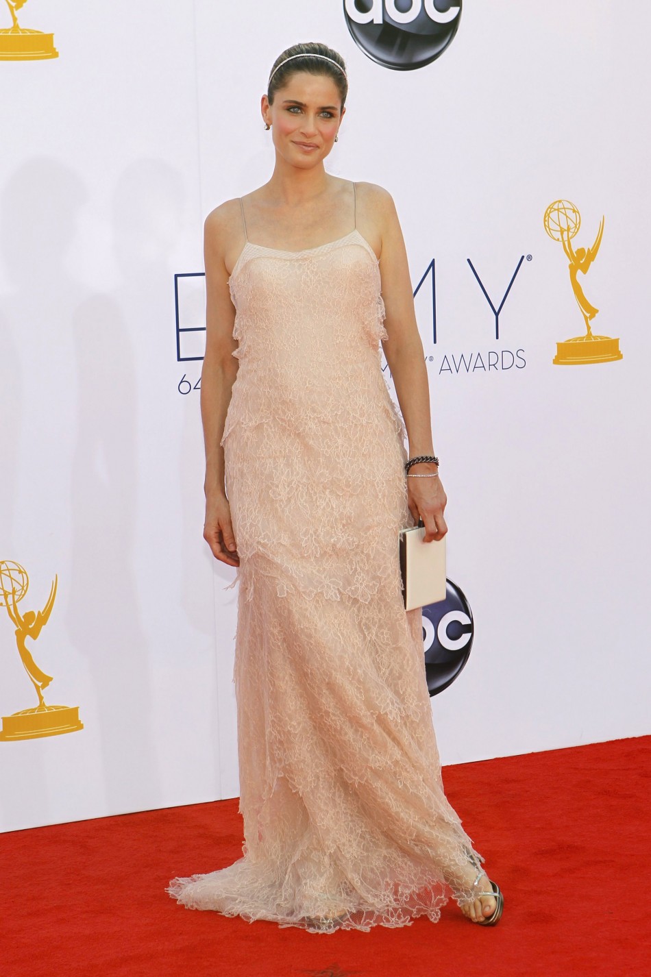 Actress Amanda Peet arrives at the 64th Primetime Emmy Awards in Los Angeles