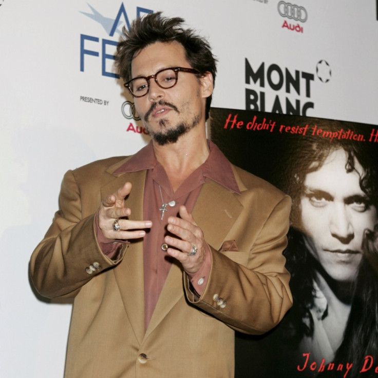 Actor Johnny Depp gestures at premiere of "The Libertine" at the American Film Institute's AFI Fest 2005 in Hollywood (Photo: Reuters)