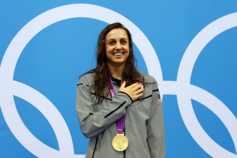 Rebecca Soni of the US smiles with her gold medal during the women's 200m breaststroke victory ceremony in the London 2012 Olympic Games at the Aquatics Centre (Photo: Reuters)