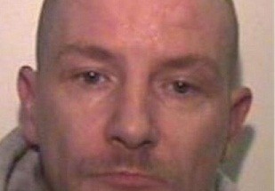 Barry Thew wore a t-shirt with one less pig; perfect justice’  written on it (Greater Manchester Police)