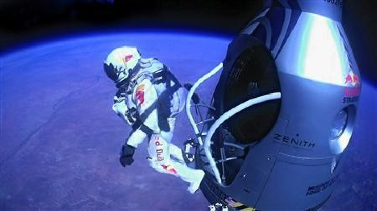 Felix Baumgartner of Austria jumps out of the capsule during the final manned flight for Red Bull Stratos in Roswell, New Mexico