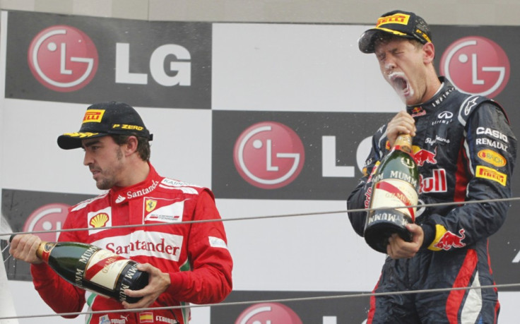 Fernando Alonso (L) and Sebastian Vettel