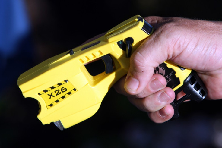 Taser guns deliver 50,000 volts of electricity into the body through two 21 feet electric wires. (