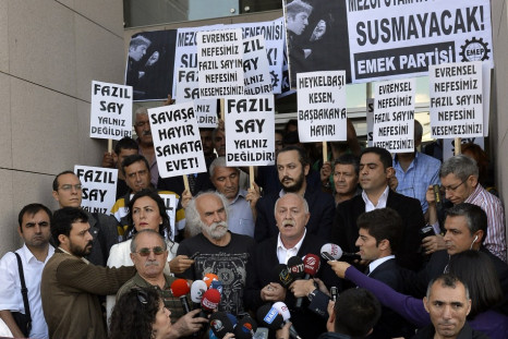 Supporters of Turkish classical pianist Fazil Say demonstrate in front of the court house in Istanbul