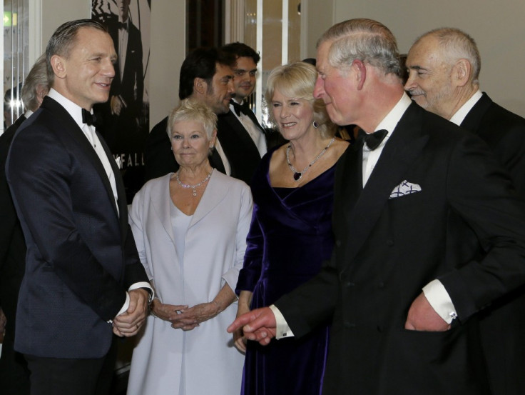Britain's Prince Charles and Camilla, Duchess of Cornwall meet actors Daniel Craig and Judi Dench as they arrive for the royal world premiere of the new 007 film "Skyfall" at the Royal Albert Hall in London