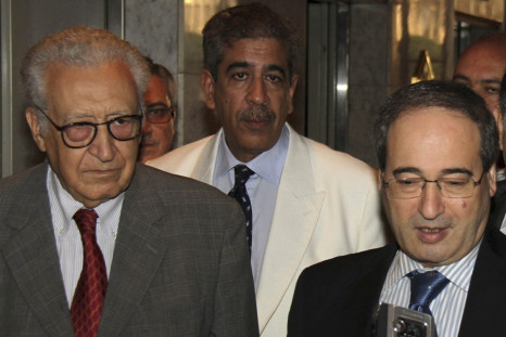 Syria's Deputy Foreign Minister Faisal Mekdad (R) speaks to reporters next to U.N.-Arab League peace envoy for Syria Lakhdar Brahimi (L)