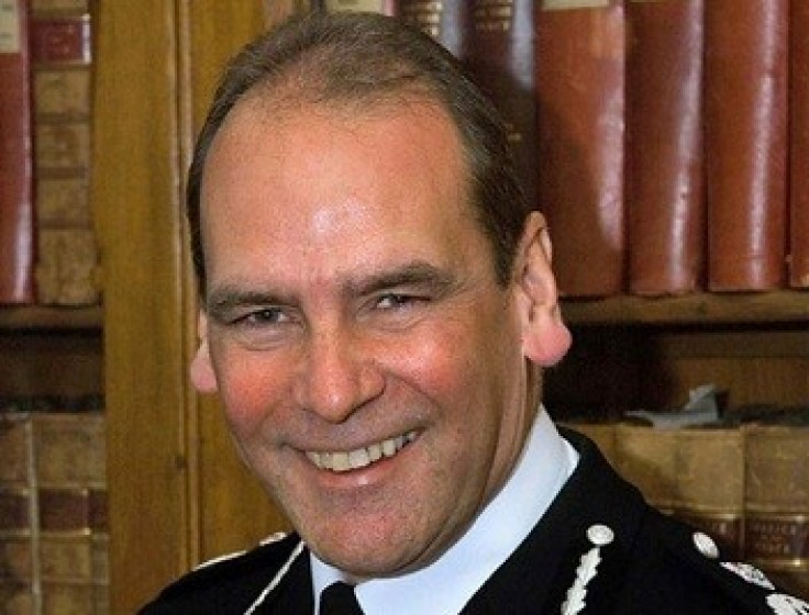 Sir Norman Bettinson said he resigned as his role  had become "a distraction to policing" (West Yorkshire Police)