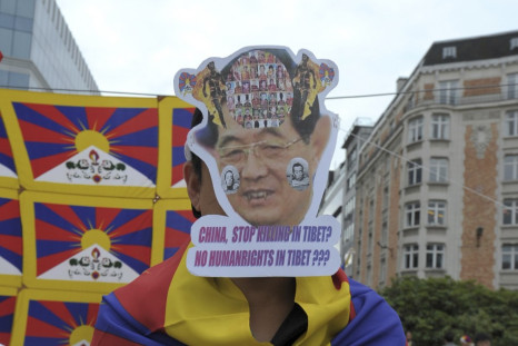 Tibet pro-independence activists demonstrate during a protest in Brussels