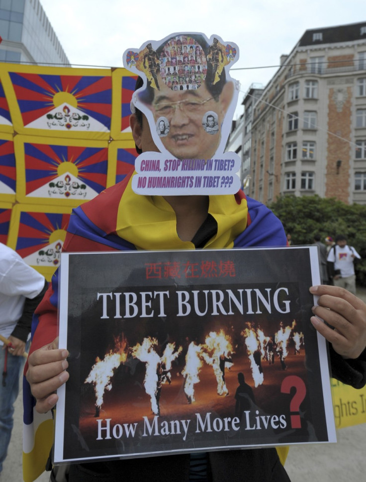 Tibet pro-independence activists demonstrate during a protest in Brussels