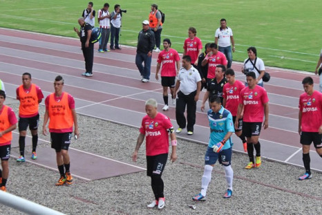 Deportivo players trudge off after kit sparks chaos