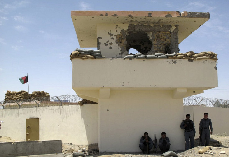 Friend or foe? Afghan policeman at checkpoint