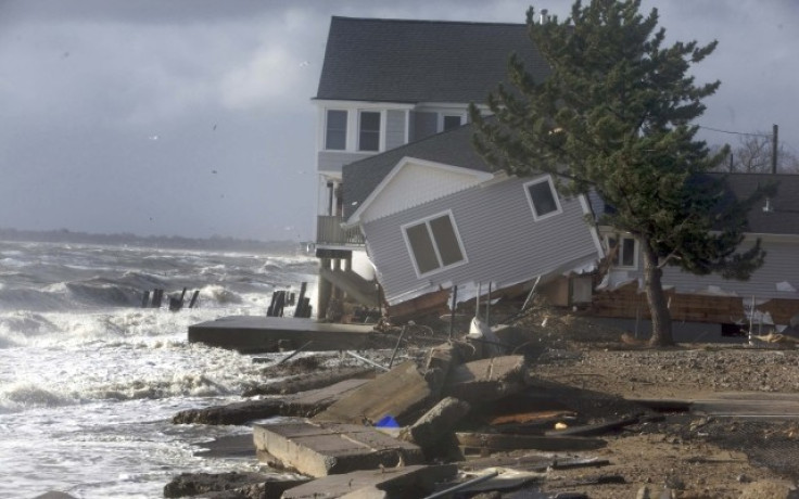 A home sits along the shoreline badly damaged by Hurricane Sandy in Milford, Connecticut. Human bones were discovered in New Haven as Sandy uprooted a tree. (Photo: REUTERS)