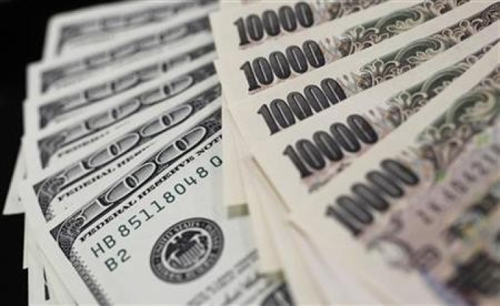 A picture illustration shows U.S. 100 dollar bank notes and Japanese 10,000 yen notes taken in Tokyo A picture illustration shows U.S. 100 dollar bank notes and Japanese 10,000 yen notes taken in Tokyo
