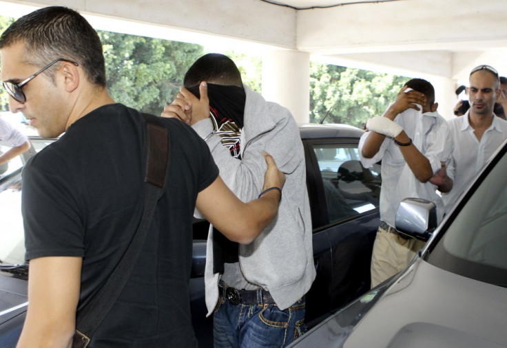Police in Cyprus with two of the suspects