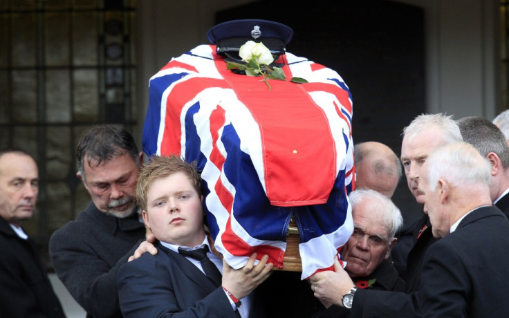 The coffin of David Black is carried from Molesworth Presbyterian Church in Cookstown, Northern Ireland (Reuters)