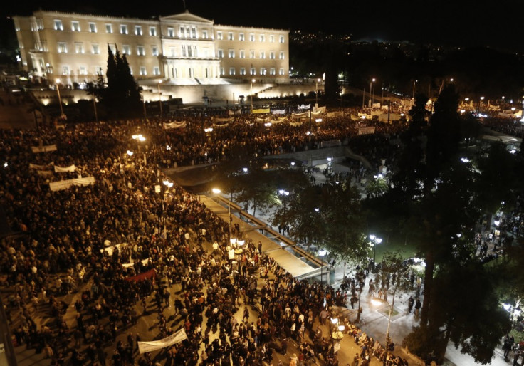 Protestors gather in front of the parliament in Syntagma square in central Athens during a 48-hour strike by the two major Greek workers unions (Reuters)