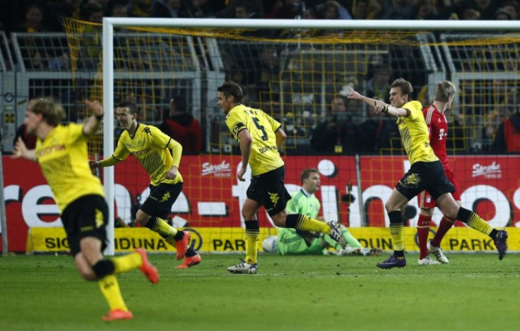 Watch highlights of Borussia Dortmund's crucial victory over Bayern Munich in the Bundesliga.