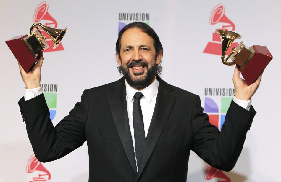 Guerra holds his awards for producer of the year and album of the year for Juanes - MTV Unplugged during the 13th Latin Grammy Awards in Las Vegas