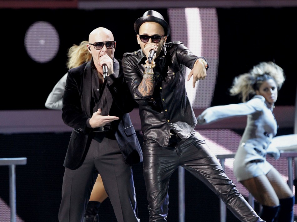 Pitbull and Sensato perform during the 13th Latin Grammy Awards in Las Vegas