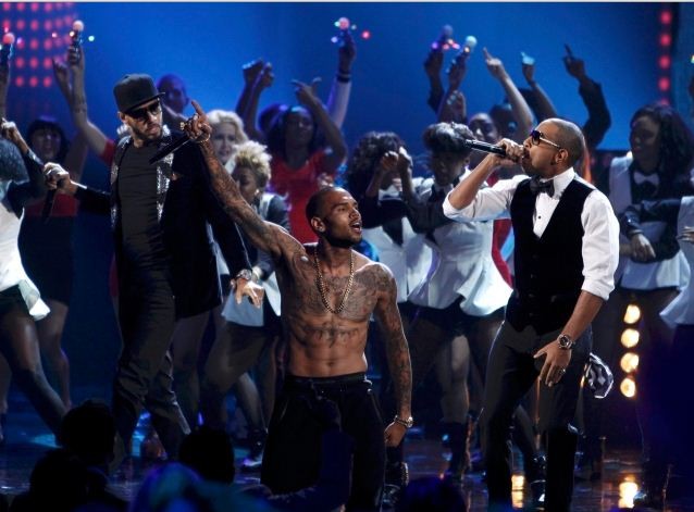 Chris Brown and Swizz Beatz perform at the 40th American Music Awards in Los Angeles