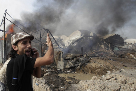 Palestinian shouts in front of what witnesses said are destroyed tunnels after Israeli air strike