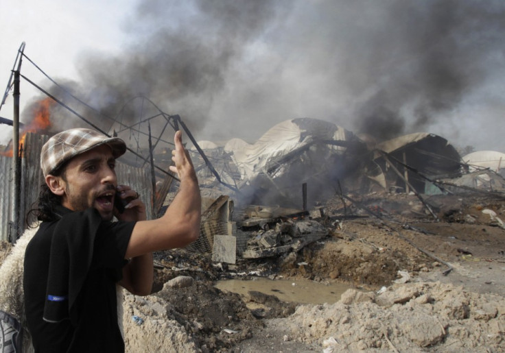 Palestinian shouts in front of what witnesses said are destroyed tunnels after Israeli air strike