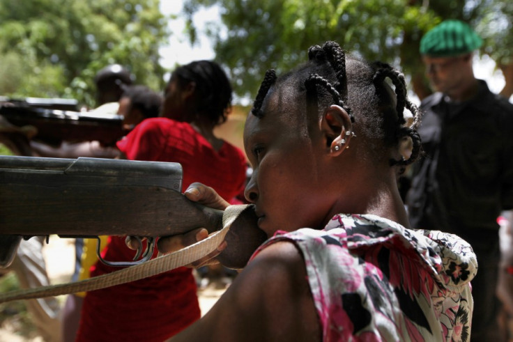 Members of a self-desfense militia train northeast of the capital Bamako