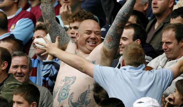 Happier times: West Ham fans cheer w win against Bolton Wanderers.