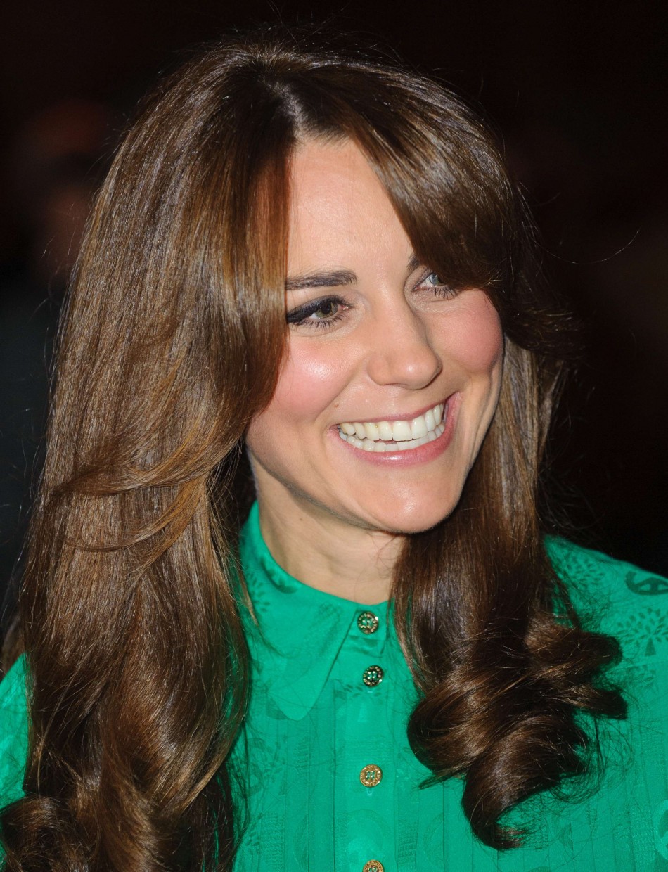 Duchess of Cambridge smiles during a visit to the Natural History Museum where she officially opened the new Treasures Gallery, in central London