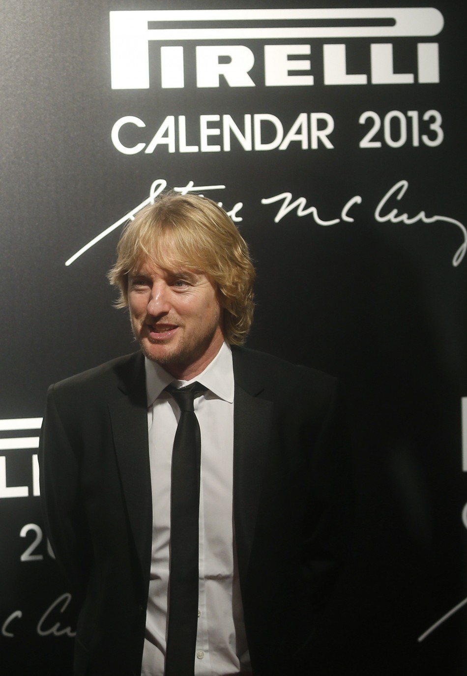 U.S. actor Owen Wilson poses during the arrivals for the launch of the Pirelli Calendar 2013 in Rio de Janeiro