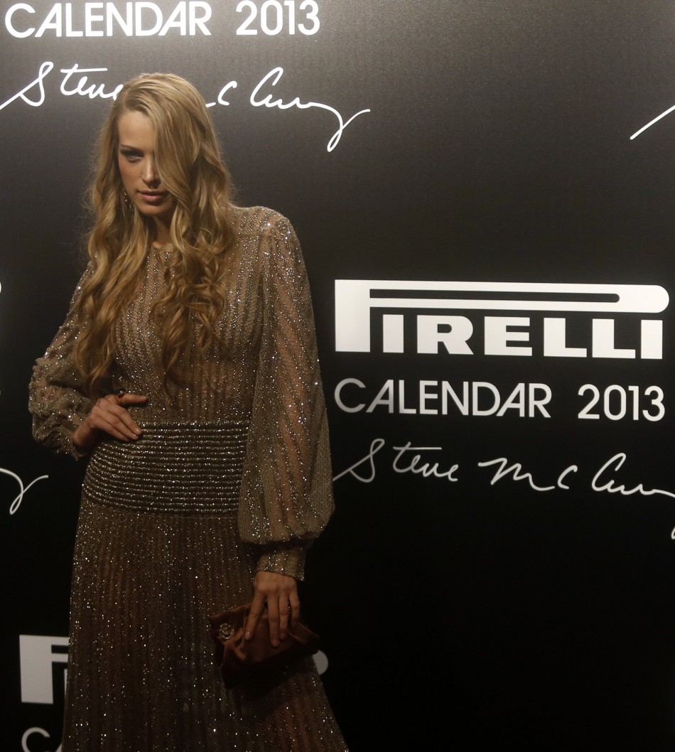 Model Petra Nemcova poses as she arrives for the launch of the Pirelli Calendar 2013 in Rio de Janeiro